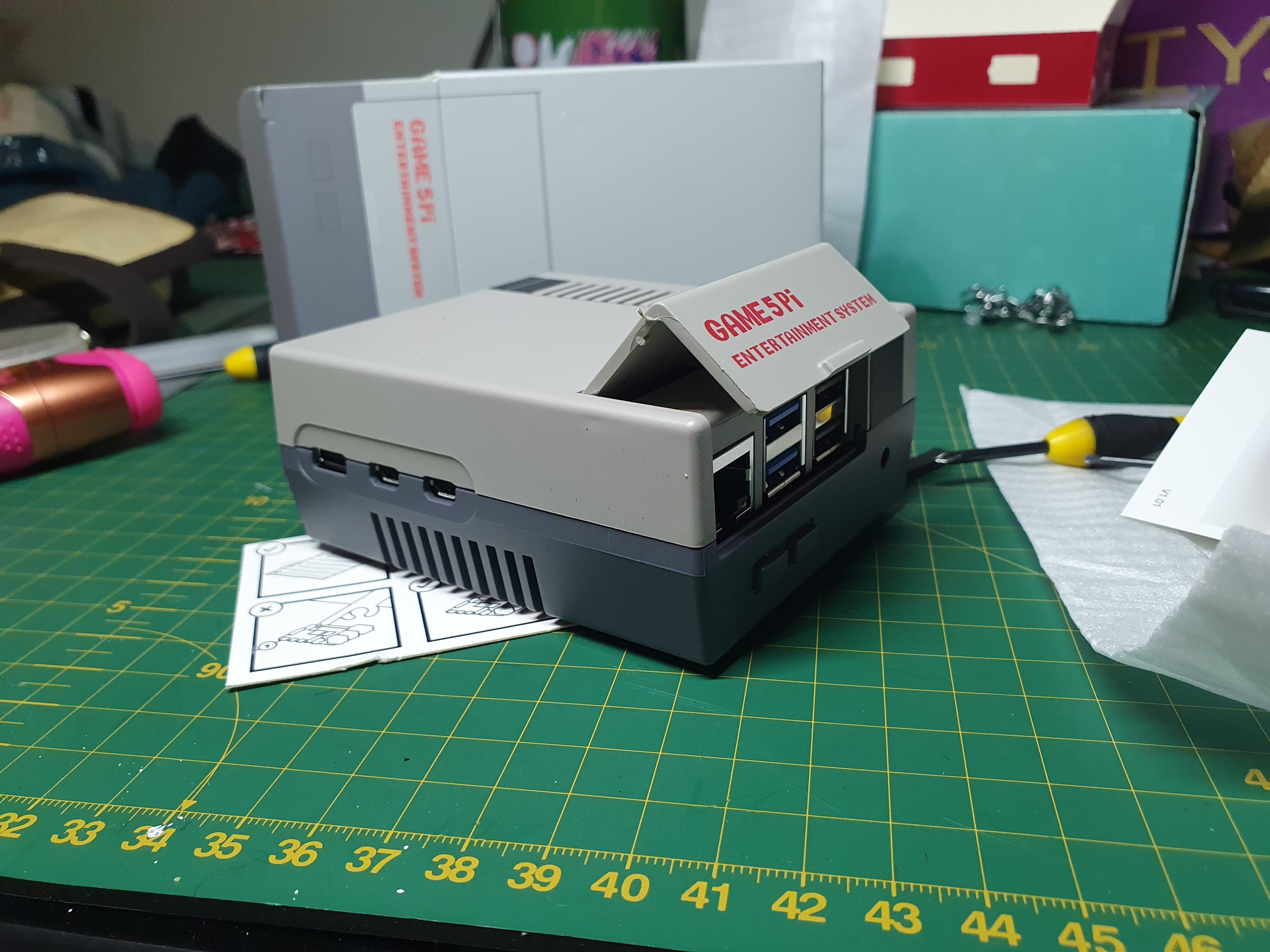 Raspberry Pi 5 with Nintendo NES style cover.
